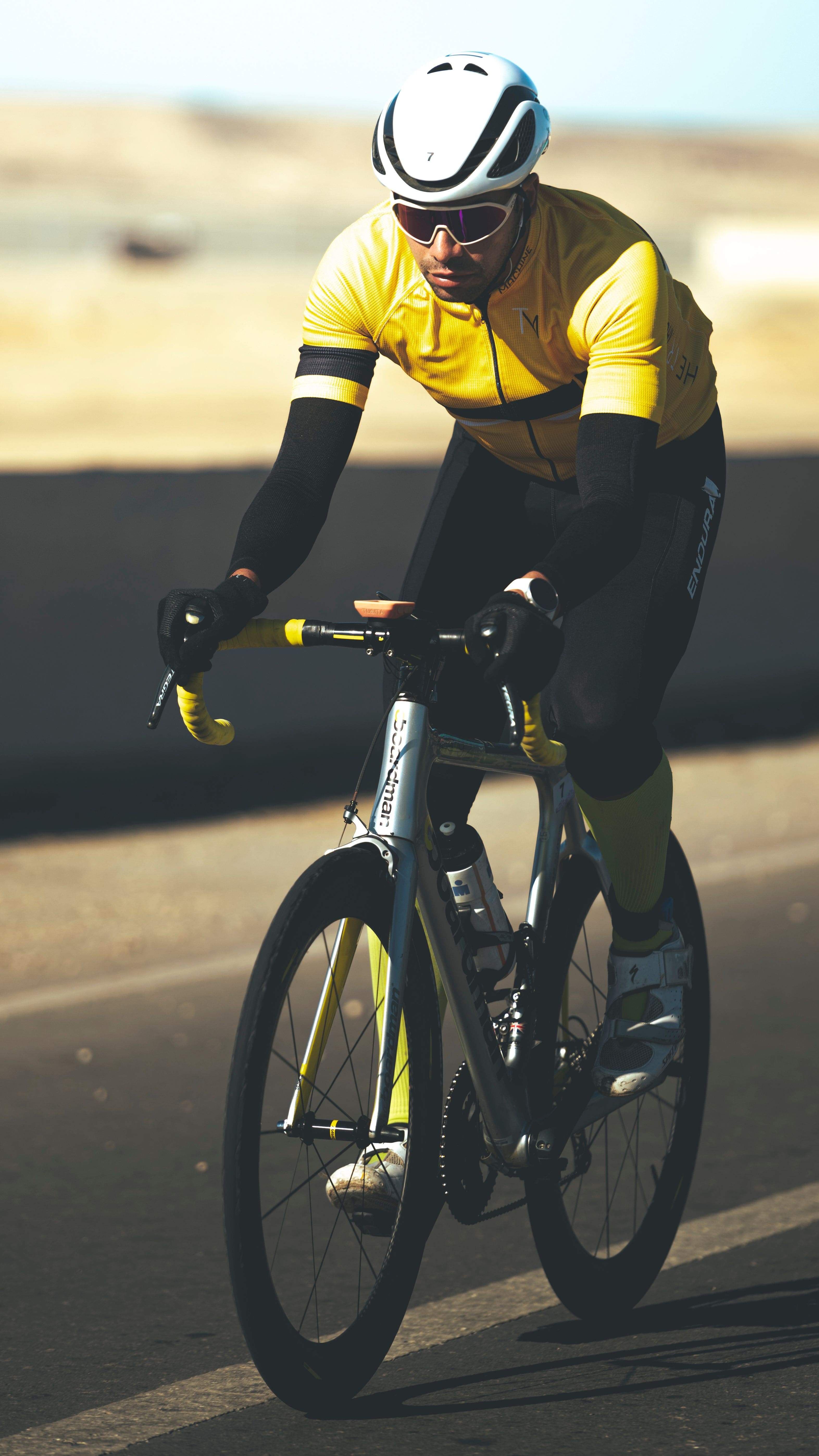 Cyclist on a coastal road in Gran Canaria
